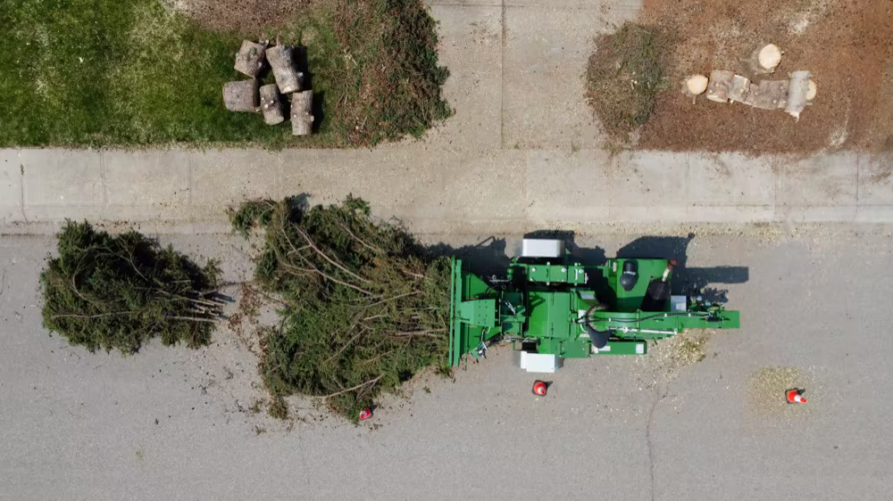 Aerial view of chipper crew working a residential street